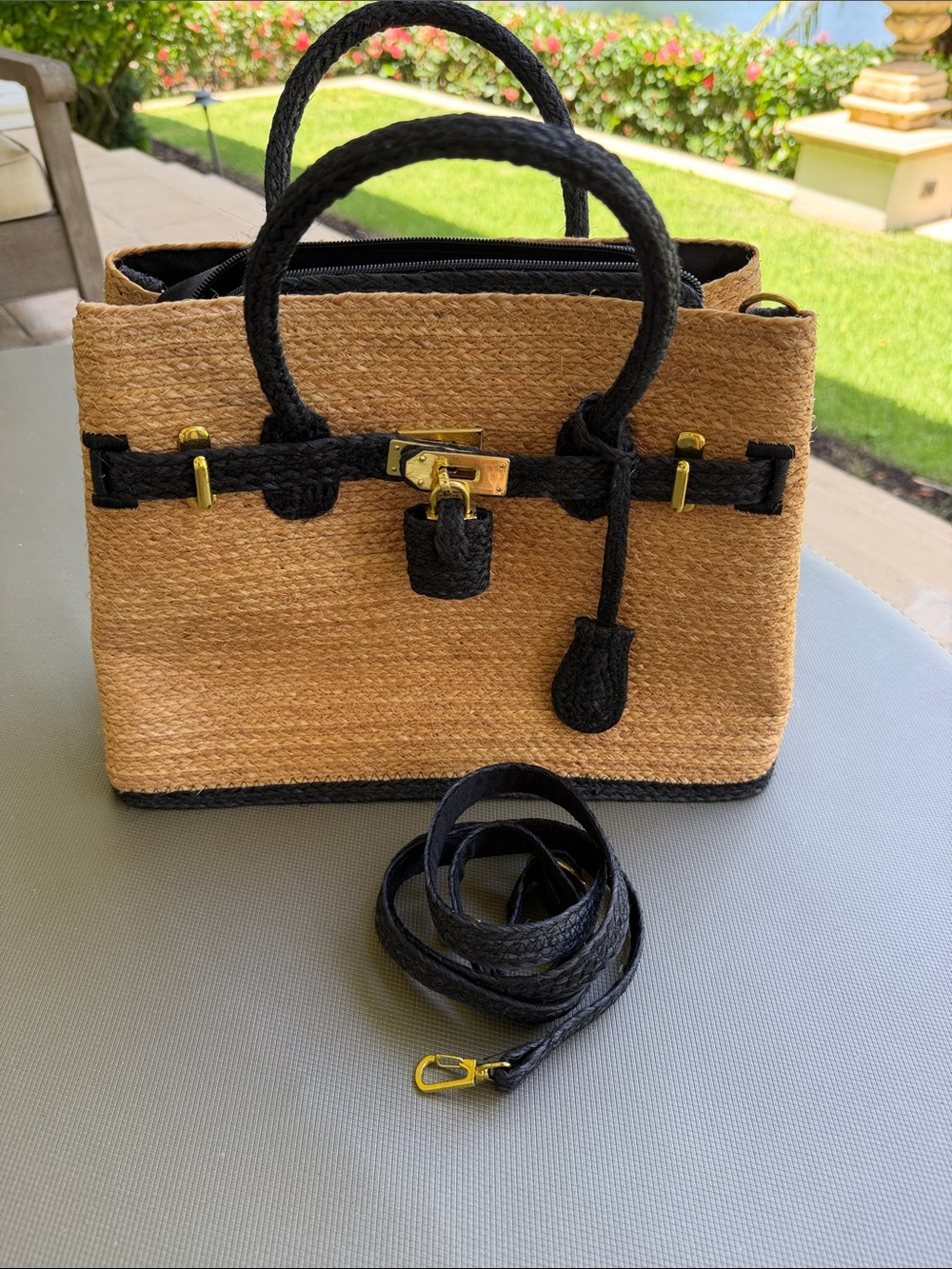 Woven Straw Birkin Style Purse with Navy Trim/Accents and Gold tone hardware. - Picture 7 of 10